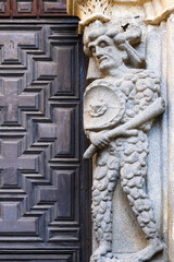 Decoration statue in entrance door. Medieval cathedral architecture building in Avila, Spain