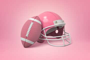 Naklejka premium Pink American football helmet and ball