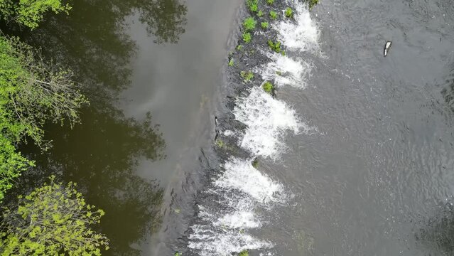 Aerial video over a stream in the Saint Loup Le Maire region, France