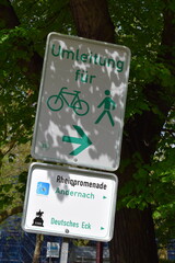 way sign to walk or ride a bike around the blocked road