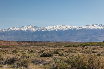 A snow-capped line of mountain peaks, the Sierra Nevada stretch across the California skyline