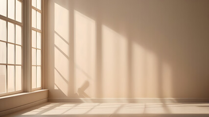 Obraz premium Minimalistic a light beige background for product presentation with light and intricate shadow from the window and wall