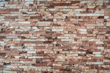 Obraz premium Panoramic background of wide old red brick wall texture. Home or office design backdrop