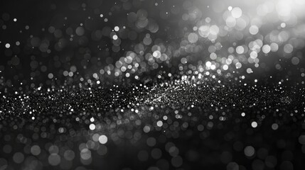 A black and white image of a starry night sky with a lot of glitter. The glitter is scattered all over the sky, giving it a dreamy and ethereal feel. Concept of wonder and awe