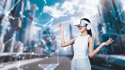 Female stand wear white VR headset and white sleeveless connect metaverse, future technology create...