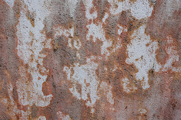 Rust colored painted cement wall background and wallpaper texture