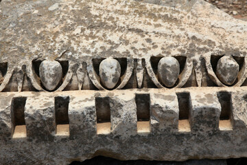 Pattern elements carved in stone in Ephesus Ancient City, Selcuk, Turkey.