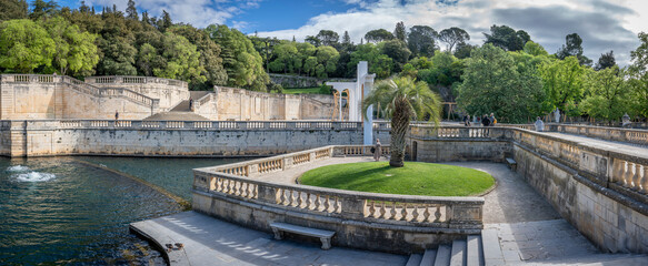 Nîmes, France - 04 17 2024: The Gardens of The Fountain. View of Sanctuary of the Fountain with a...