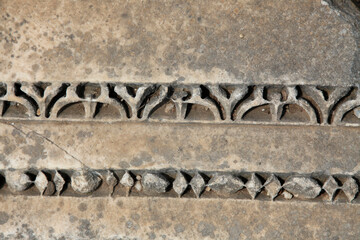 Pattern elements carved in stone in Ephesus Ancient City, Selcuk, Turkey.