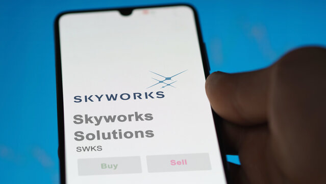 April 09th 2024 , Irvine, California. Close up on logo of Skyworks Solutions on the screen of an exchange. Skyworks Solutions price stocks, $SWKS on a device.
