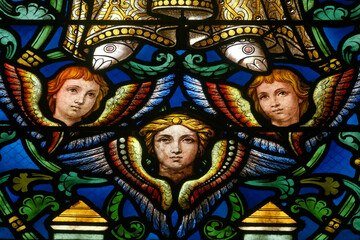 Obraz premium A stained-glass window depicting angels. Vitrail représentant des anges. Aix-les-Bains - France.