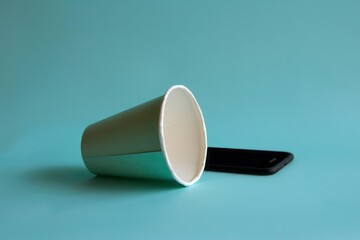 A hack for amplifying a phone speaker using a simple paper cup
