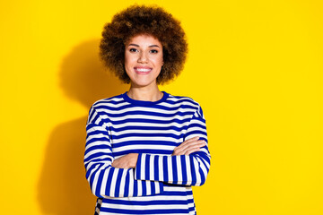 Photo of cheerful friendly woman with perming coiffure wear striped shirt holding arms crossed...