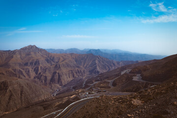 Jebel jais mountain, Majestic Rocky Mountains Under Clear Blue Sky During a Sunny Day