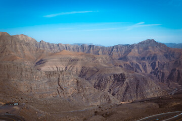 Jebel jais mountain, Majestic Rocky Mountains Under Clear Blue Sky During a Sunny Day