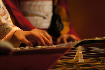 Traditional Japanese instruments and a woman in a kimono