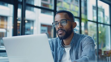Obraz premium Professional Man with Laptop at Work