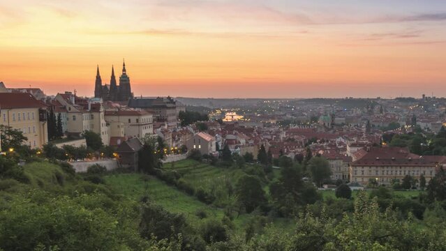 Prague Czechia Czech Republic time lapse, high angle view city skyline night to day sunrise of old town and Prague Castle