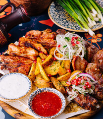 Traditional georgian feast with assorted grilled meats