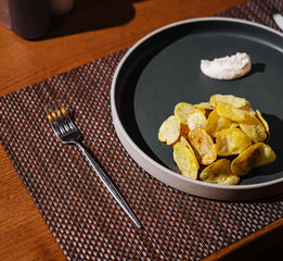 Elegant table setting with gourmet chips and dip