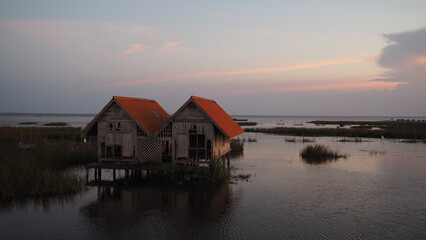 Fototapeta premium The sun sets at a certain place. Under the peace and beauty
