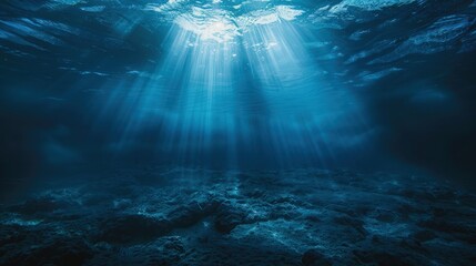 ethereal beauty of an underwater sea illuminated by shimmering blue sunlight, the serenity and mystique of the ocean depths