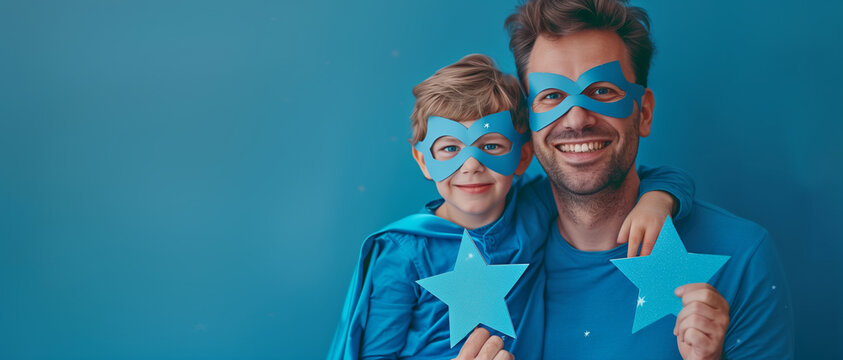 Happy Father's Day. Father and son dressed as superheroes, sharing a joyful embrace, with masks and capes, against a vibrant blue background - Powered by Adobe