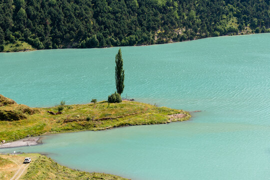 An island on the reservoir of the Zaramag hydroelectric power station in the Kassar gorge. North Ossetia - Alania. Russia