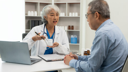 Senior Asian female doctor examining patient's health, basic procedures for general examination...