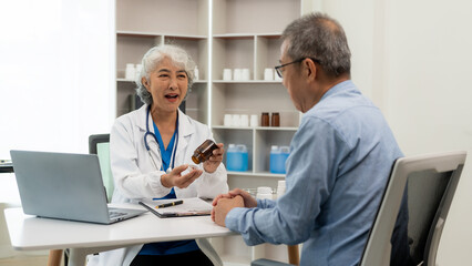Senior Asian female doctor examining patient's health, basic procedures for general examination...