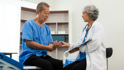 Senior Asian female doctor examining patient's health, basic procedures for general examination history taking Physical examination, gastritis, high blood pressure, medical consultant concept