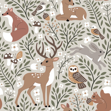 Fototapeta Seamless vector pattern with cute woodland animals, flowers and leaves. Perfect for textile, wallpaper or print design.