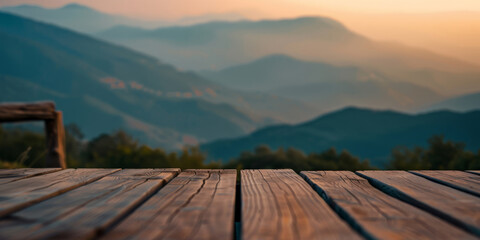 Rustic Wooden Table Offering a View of Misty Mountains at Dusk
