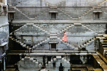 Woman at ancient stepwell in Jaipur - 803141527