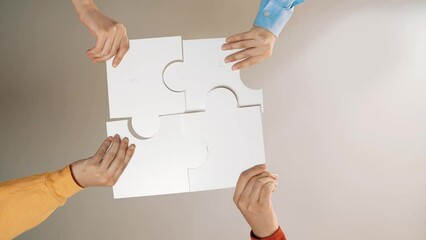 Startup company employee team gladly stacking hand together symbolize successful group of business partnership and strong collective unity teamwork in community workplace in panoramic video. Synergic
