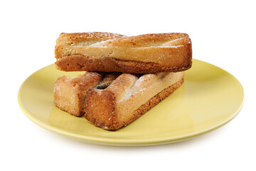 Several delicious crispy cookies lying on a yellow plate isolated on a white background.