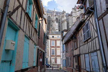 Beautiful street with traditional French buildings with wooden beams and colorful, surroundings of...