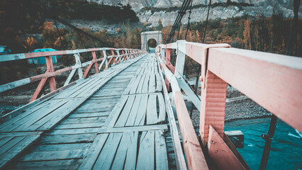 Ancient wooden bridge who believes that two sides give life a place to travel - obrazy, fototapety, plakaty
