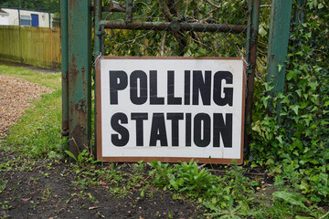 sign for public Polling Station in the UK. government and local council elections. place to vote