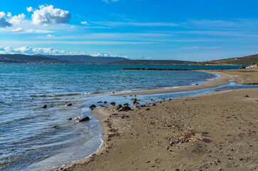 sand beach on Yumru Koyu Bay coast in Alacati (Izmir province, Turkey)	