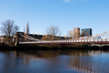 Glasgow Scotland: 12th Feb 2024: South Portland Street Suspension Bridge on River Clyde during sunny winter morning