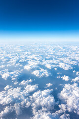 The view from the airplane window.
Blue sky above the clouds.