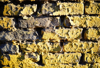 Yellow brick grunge street wall texture background