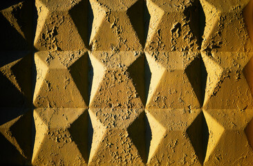 Yellow vintage concrete panels texture background