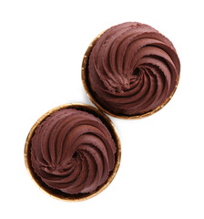 Delicious chocolate cupcakes isolated on white, top view