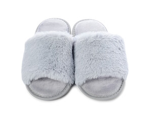 Pair of soft slippers with fur isolated on white