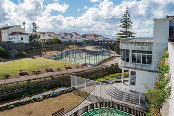 Ribeira Grande garden with stream, tennis court and aqueduct and sea in the background, São Miguel...