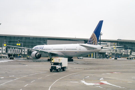Calgary, Canada, April 14, 2022; A United Airlines wide body Boeing 777 on the tarmac at YYC Calgary International Airport
