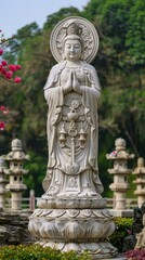 Fototapeta premium White marble statue of Avalokiteshvara, the bodhisattva of compassion, at the Lingyin Temple in Hangzhou, China
