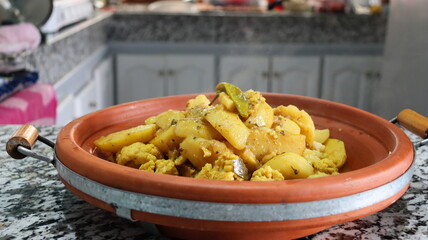 Traditional Moroccan Tagine - Potatoes and Cauliflower - Authentic North African Cuisine - Aromatic, Hearty, and Healthy Dish